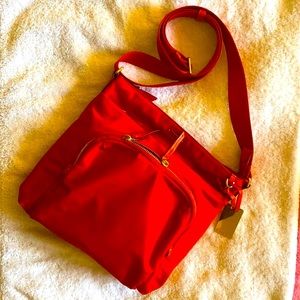 Tumi red crossbody messenger bag